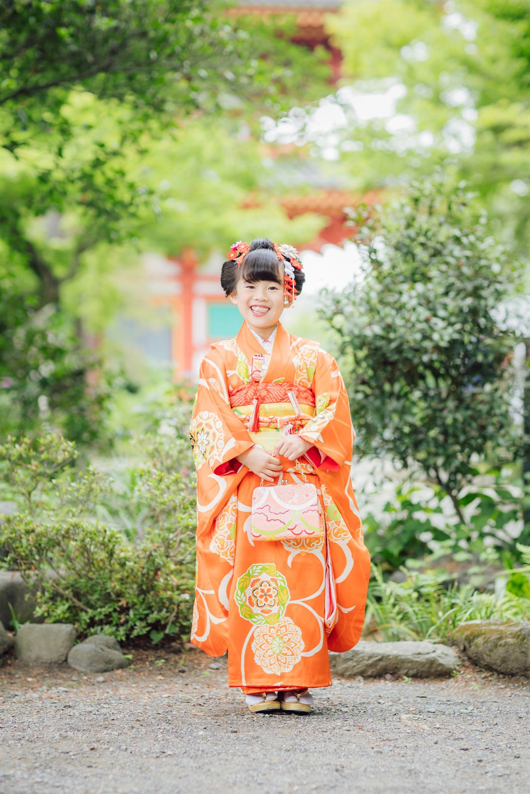 Shichi-Go-San, age 7 — orange kimono at Takahata-Fudoson